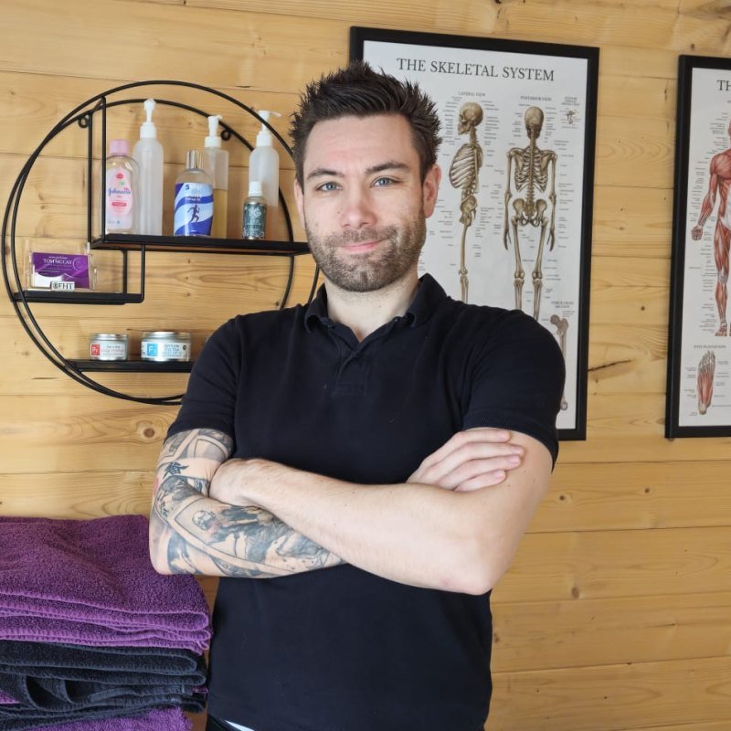 Tom McCay, Level 5 sports massage therapist, in his Welling clinic